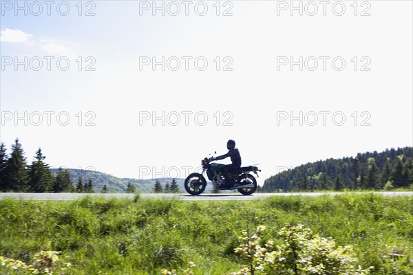 Motorbike on country road. Photo : Johannes Kroemer
