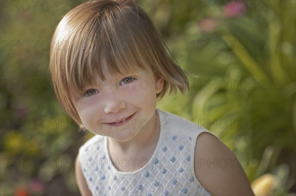 Portrait of girl (2-3) in garden. Photo : FBP