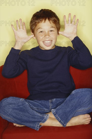 Playful young boy. Photo : Fisher Litwin