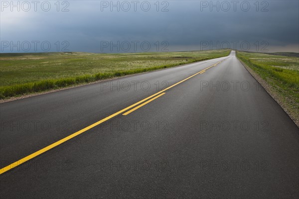 Highway crossing Badlands National Park.