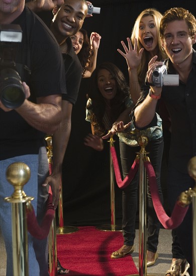 Paparazzi at red carpet event. Photo : Jamie Grill