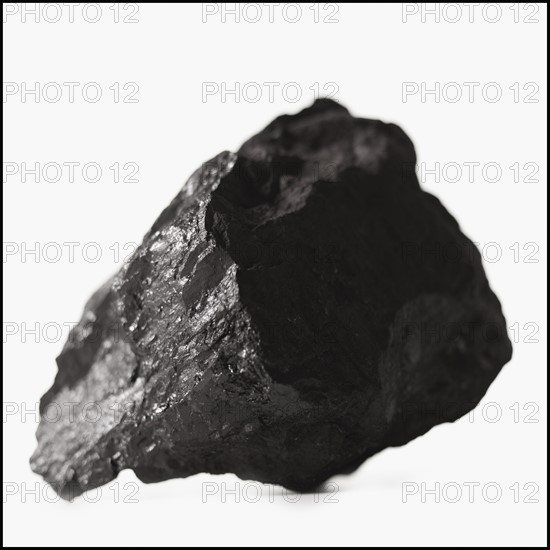 Coal on white background. Photo : Mike Kemp