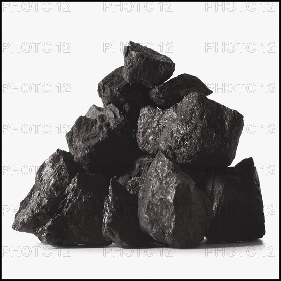 Coal on white background. Photo : Mike Kemp