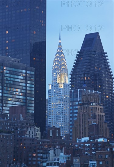 USA, New York State, New York City, Manhattan, Skyscrapers and Chrysler Building at dusk. Photo : fotog