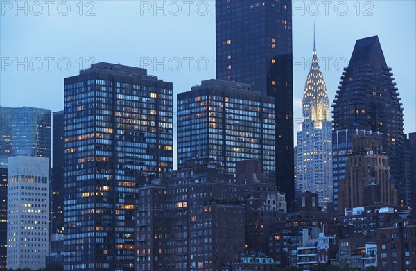 USA, New York State, New York City, Manhattan, Skyscrapers and Chrysler Building at dusk. Photo : fotog