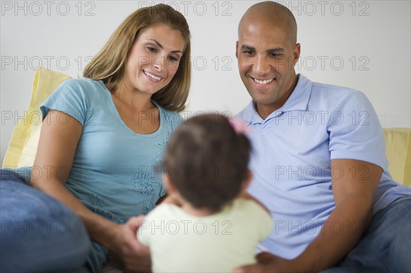 Young family with small girl (12-18 months).