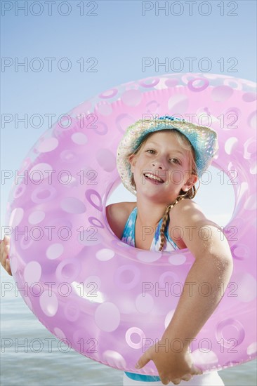 Portrait of girl (8-9) with rubber ring.