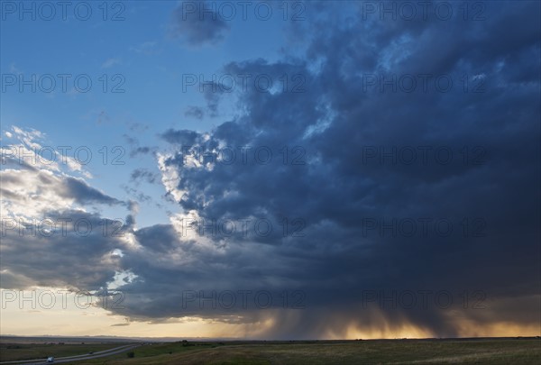Cloudscape over field.