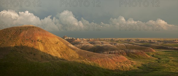 USA, South Dakota, Mountains in Badlands National Park at sunset.