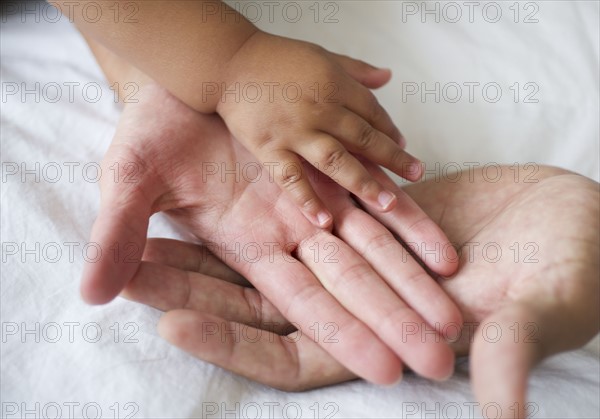 Young family with small girl (12-18 months).