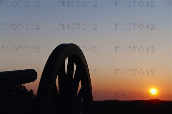 USA, Pennsylvania, Gettysburg, Cemetery Hill, cannon at sunset. Photo : Chris Grill