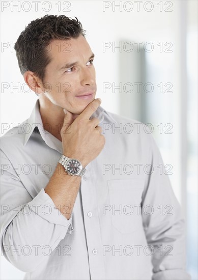 Portrait of good-looking mid adult man. Photo : Momentimages