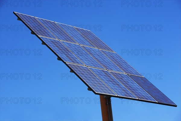 Solar panel against blue sky. Photo : fotog