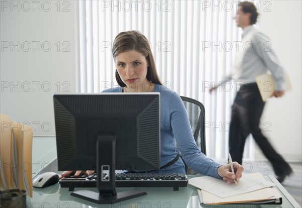 Studio shot of office workers.