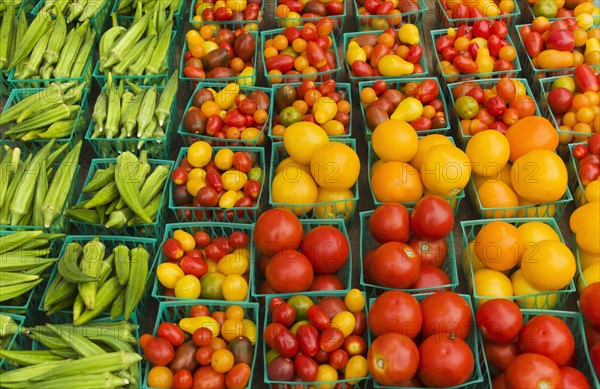 Boxes with vegetables on street market.