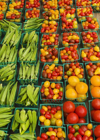 Boxes with vegetables on street market.