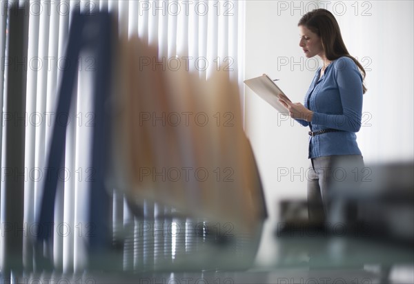 Woman in office.