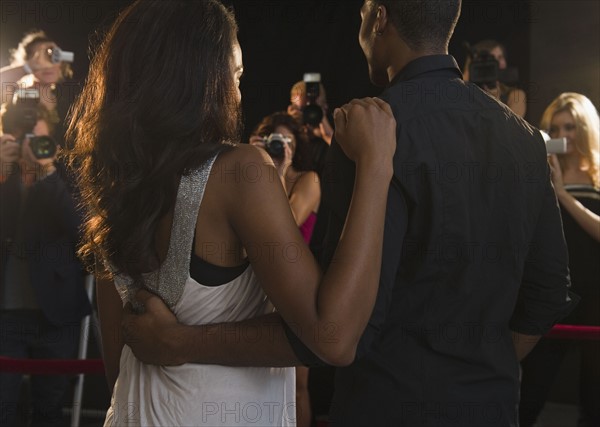 Paparazzi photographing celebrities at red carpet event. Photo : Jamie Grill