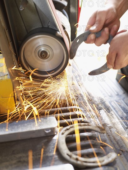 Man making horseshoe. Photo : John Kelly