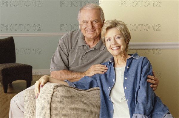 Senior couple relaxing in their home. Photo : Fisher Litwin