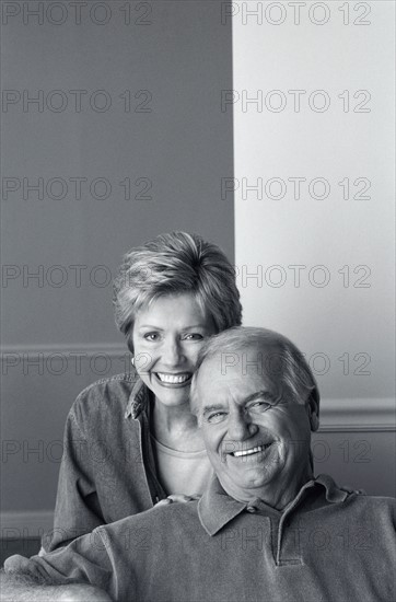 Senior couple relaxing in their home. Photo : Fisher Litwin