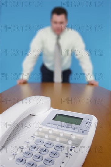 Businessman waiting by telephone. Photo : Antonio M. Rosario