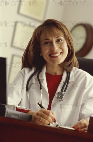 Doctor in her office. Photo : Fisher Litwin