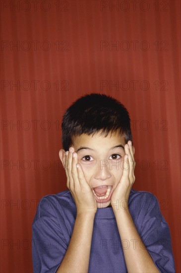 Surprised young boy. Photo : Fisher Litwin