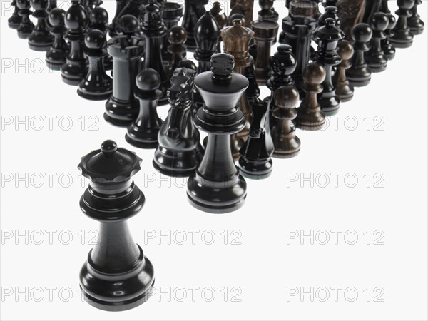 Black chess pieces with queen. Photo : David Arky