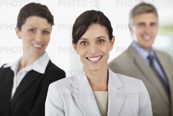 Business trio portrait. Photo : Momentimages