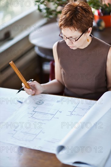 Architect working in studio. Photo : Take A Pix Media