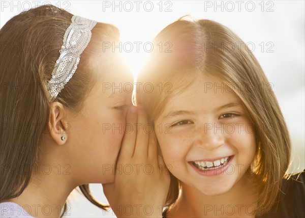 Girls (8-9,12-13) whispering. Photo : Daniel Grill