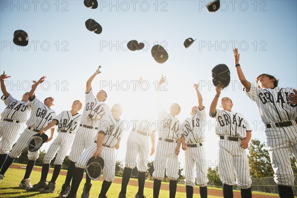 USA, California, Ladera Ranch, little league players (aged 10-11) celebrating.