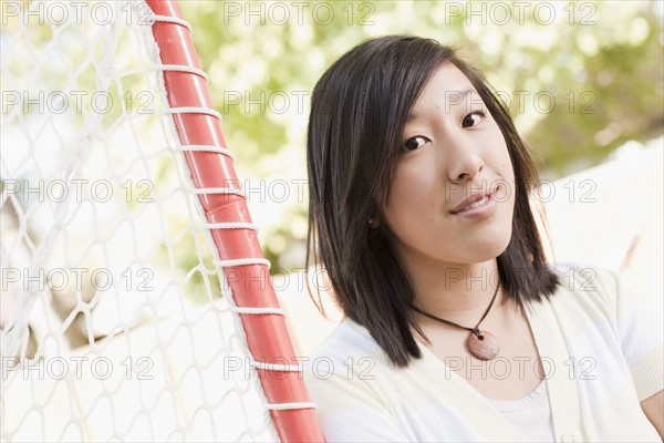 USA, Utah, portrait of young woman near goalpost. Photo : Tim Pannell