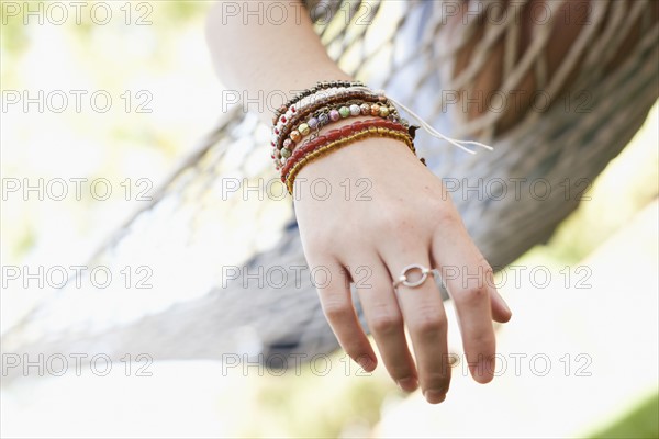 USA, Utah, close up of woman's hand on hammock. Photo : Tim Pannell