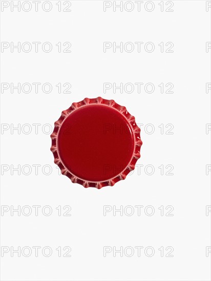 Studio shot of red bottle cap. Photo : David Arky