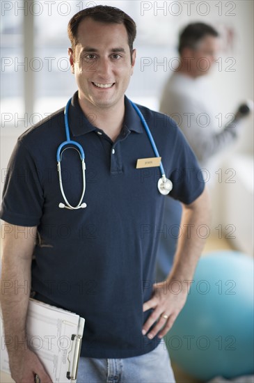 USA, New Jersey, Jersey City, Portrait of fitness instructor in gym.