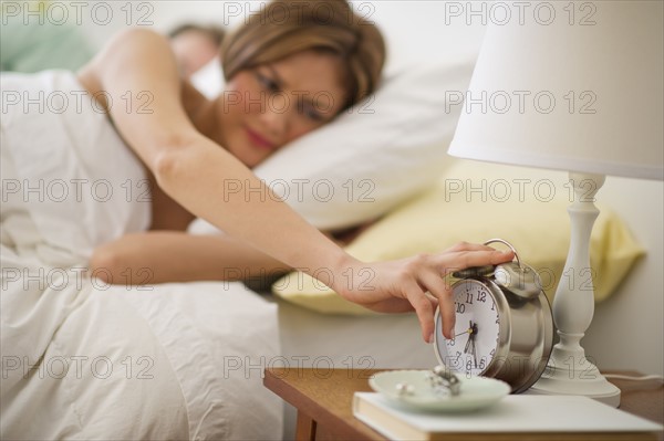 USA, New Jersey, Jersey City, Young woman waking up.