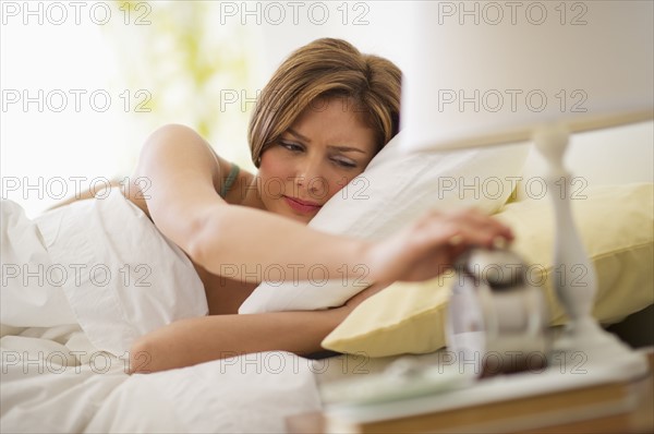 USA, New Jersey, Jersey City, Young woman waking up.