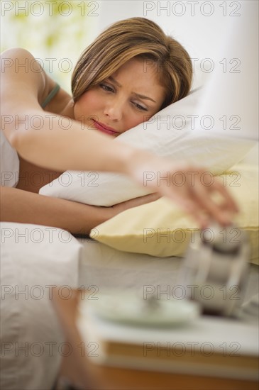 USA, New Jersey, Jersey City, Young woman waking up.