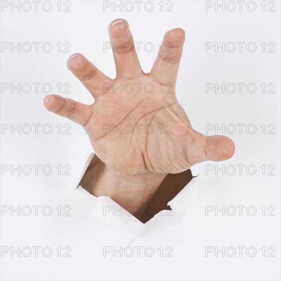 Hand on white background. Photo : Daniel Grill