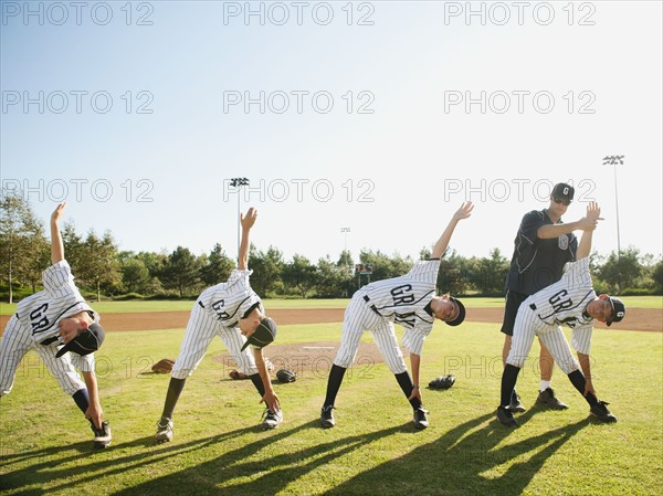 USA, California, Ladera Ranch, Coach training boys (10-11) from little league.