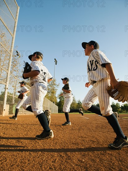 USA, California, Ladera Ranch, boys (10-11) playing baseball.