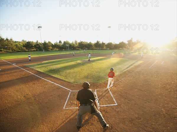 USA, California, Ladera Ranch, boys (10-11) playing baseball.