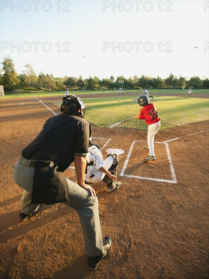 USA, California, Ladera Ranch, boys (10-11) playing baseball.