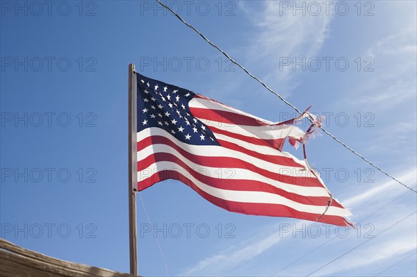 USA, Arizona, Winslow, American flag on wind. Photo : David Engelhardt