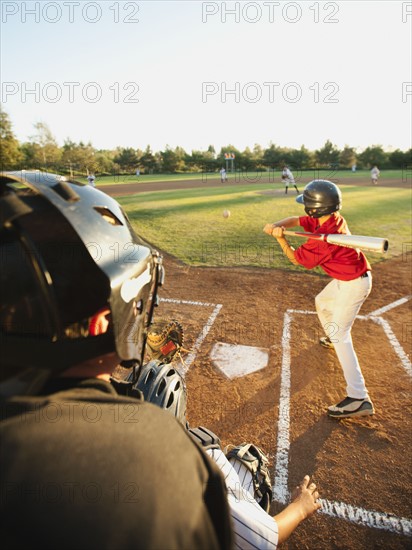 USA, California, Ladera Ranch, boys (10-11) playing baseball.