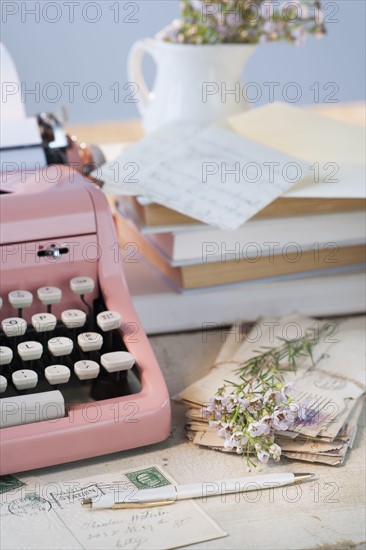 Letters by antique typewriter.