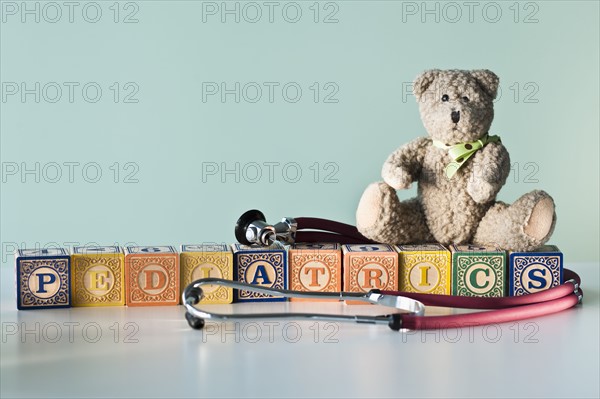 Back to school building blocks on stacked books pencil and ruler.