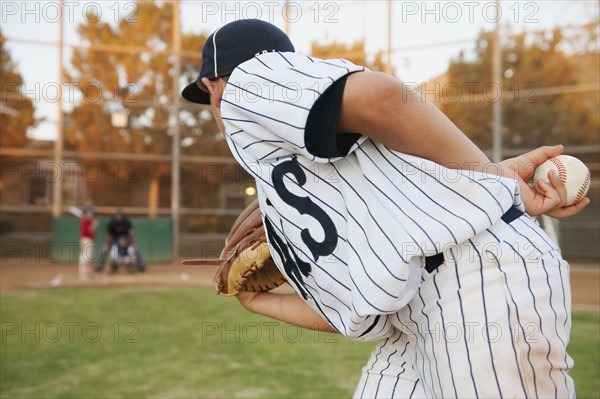 USA, California, Ladera Ranch, boy (10-11) playing baseball.